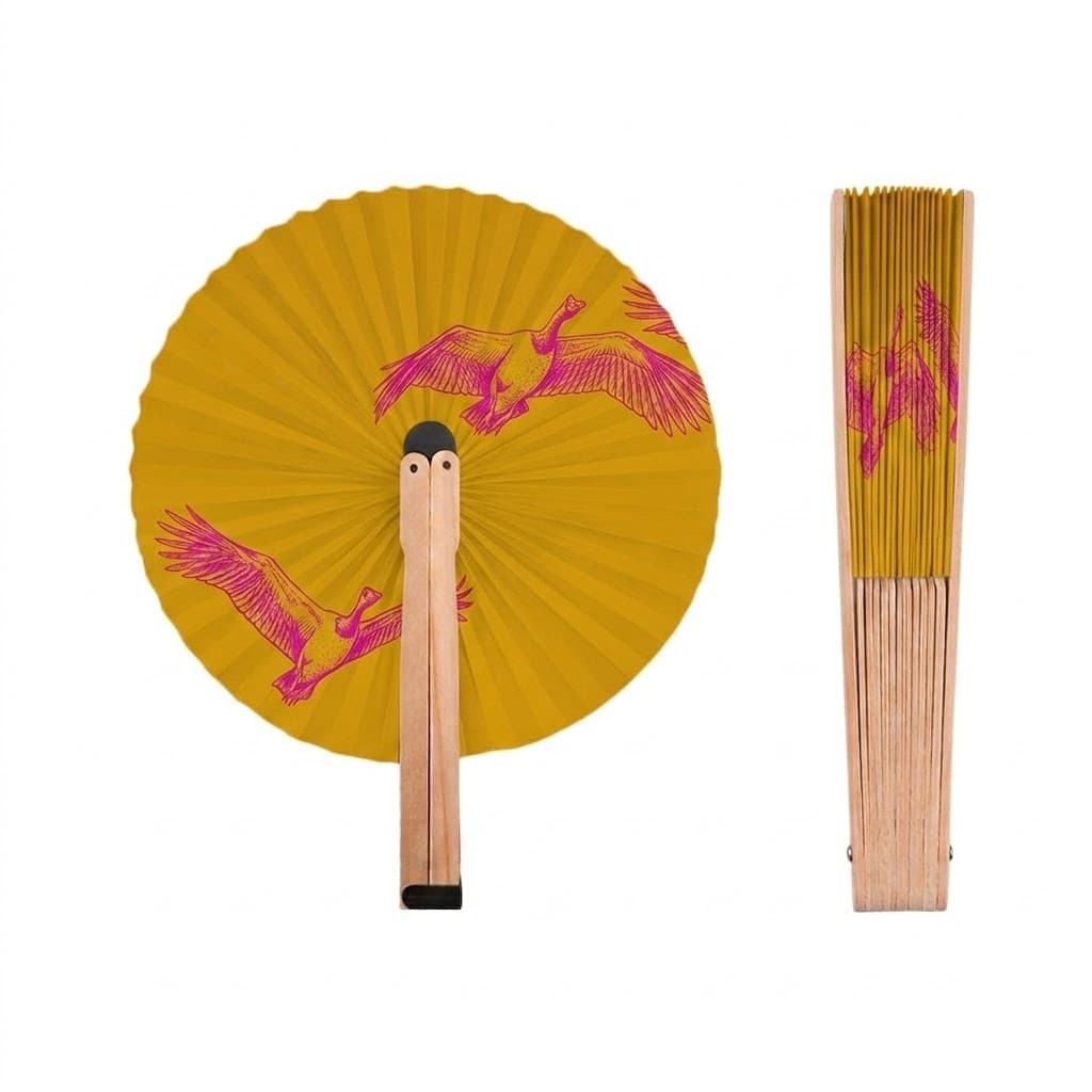 Pink magpie geese in flight on a mango fan